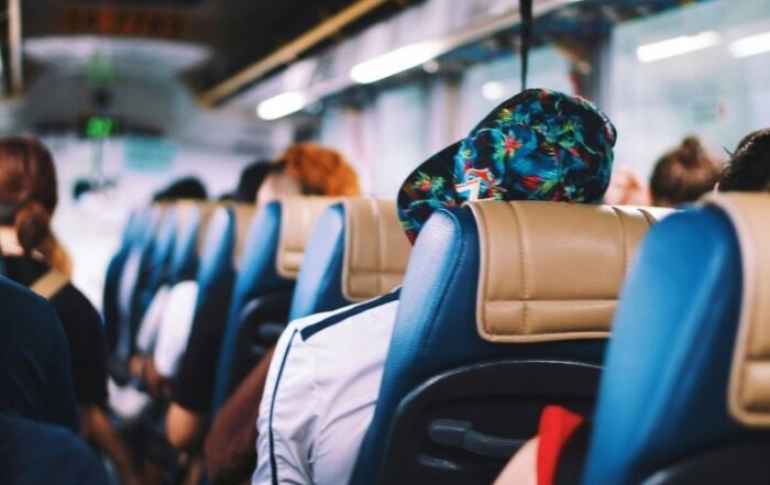 Bus interior with passengers seated